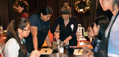 Students prepare a Canadian meal at the Loblaws grocery store in London, Ontario.